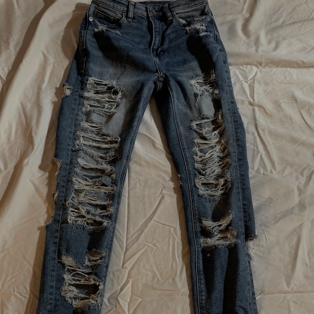 Ripped American Eagle skinny jeans.